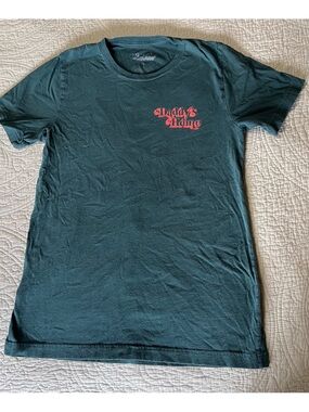 St. Vincent Daddy's Home Graphic Tee in Teal with Pink Logo